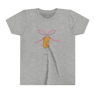 Capy Life kids heather grey t-shirt featuring a cute capybara hanging from a pink coquette bow graphic.
