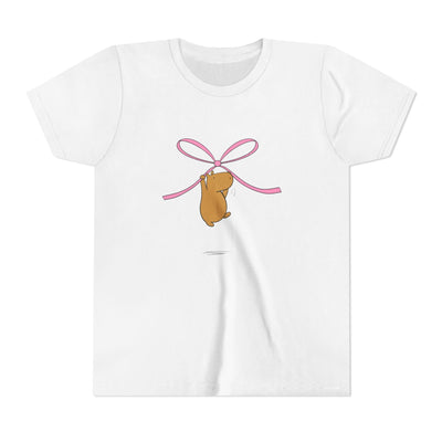 Capy Life kids white cotton t-shirt featuring a cute capybara hanging from a pink coquette bow graphic