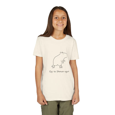 Capy Life kids cream graphic tee featuring a cute doodle of a capybara on roller skates with text Off to Shenan-again