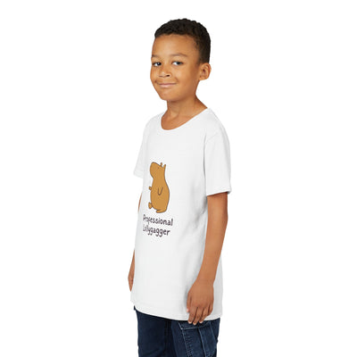 Young boy wearing a white Capy Life cotton t-shirt with a hand-drawn capybara and Professional Lollygagger text.
