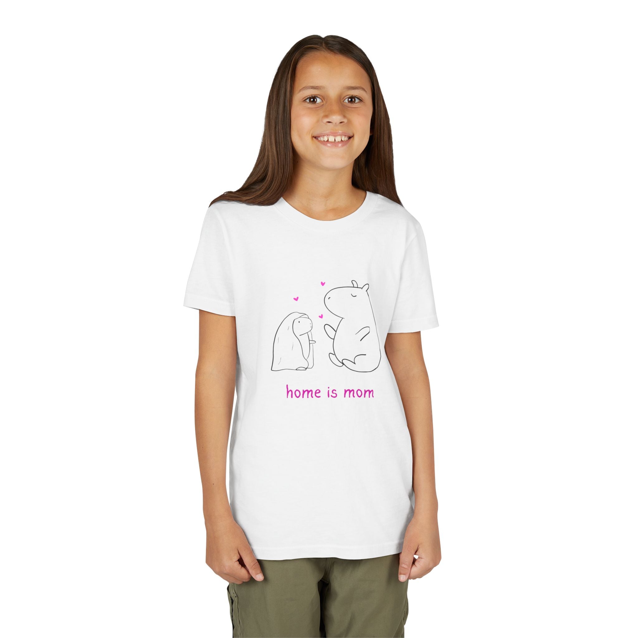 A young girl wearing a white Capy Life cotton t-shirt featuring a minimalist capybara illustration and text.
