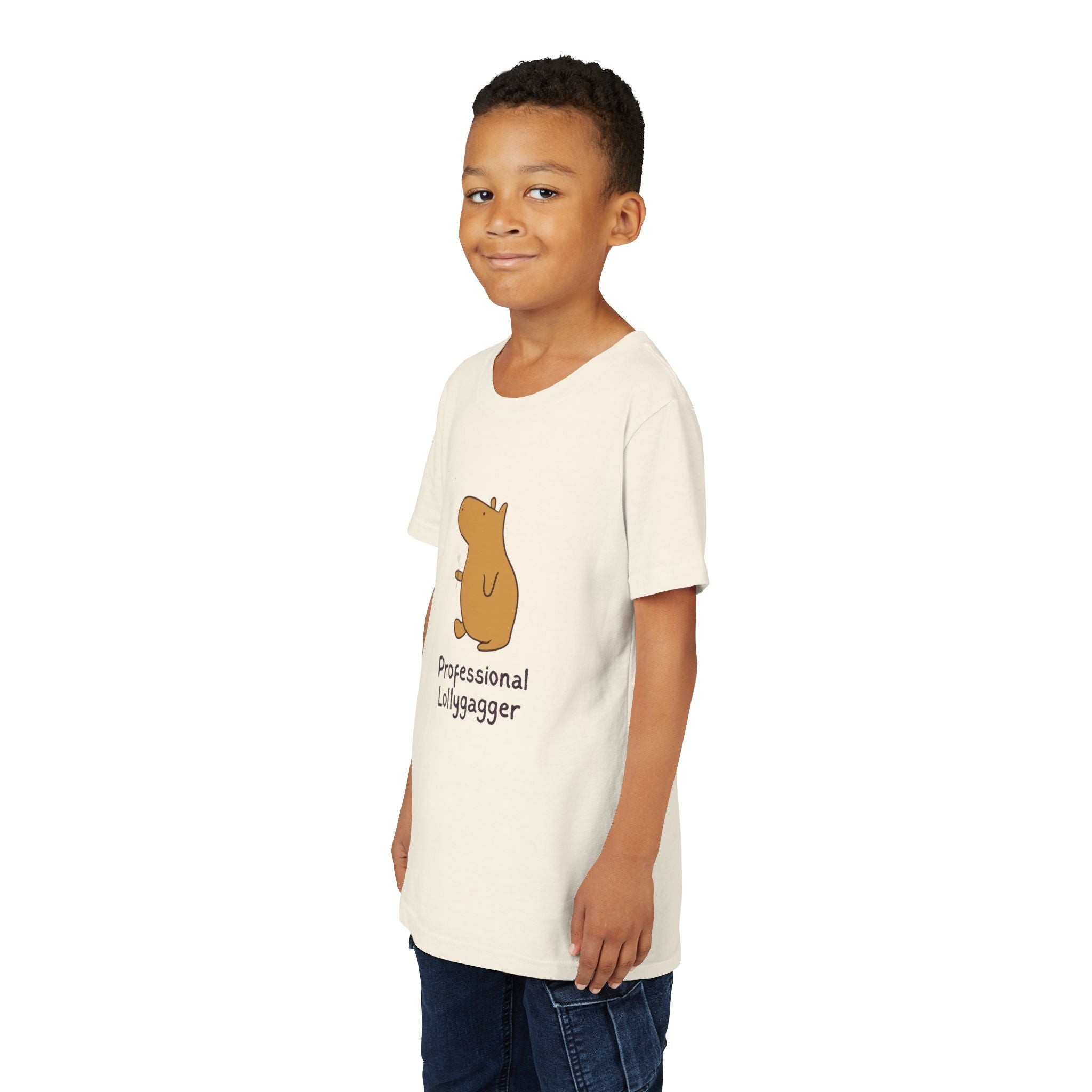 Capy Life kids t-shirt in cream cotton with a hand-drawn capybara graphic and Professional Lollygagger text