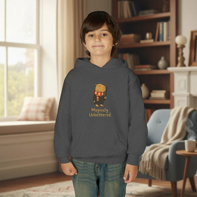 Capy Life kids dark grey hoodie featuring a cute capybara wizard illustration with the text Magically Unbothered