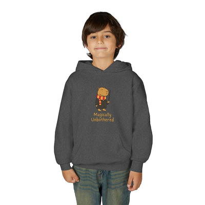 Capy Life kids dark grey hoodie featuring a cute capybara wizard illustration with the text Magically Unbothered.