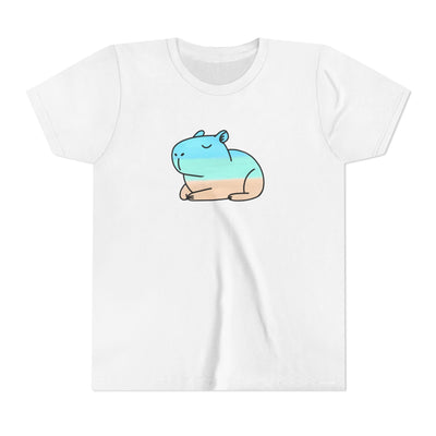Capy Life kids white t-shirt featuring a hand-painted style capybara graphic with blue and sandy coastal tones.