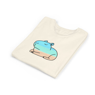 Capy Life kids coastal capybara tee in cream with a hand-painted blue and tan capybara graphic on the front