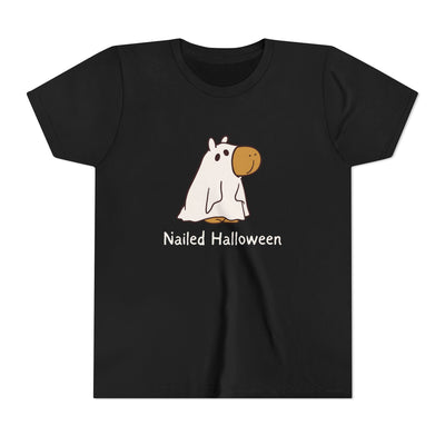 Capy Life kids black t-shirt featuring a cute capybara in a ghost costume with the text Nailed Halloween.