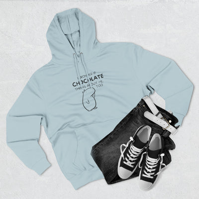 Capy Life light blue hoodie featuring Gene the Capybara line art and chocolate quote, styled with black jeans and sneakers.