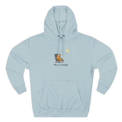 Capy Life light blue fleece hoodie featuring a minimalist graphic of a capybara relaxing under a moon with text.