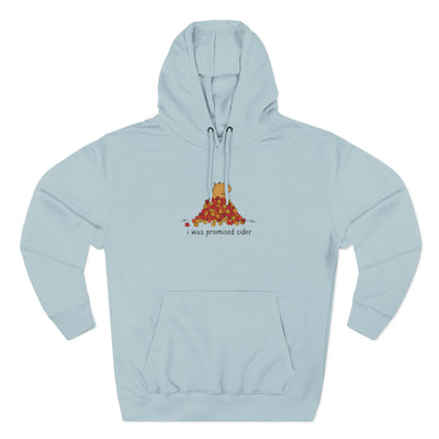 Capy Life light blue fleece hoodie featuring a graphic of a capybara in autumn leaves with the text I was promised cider