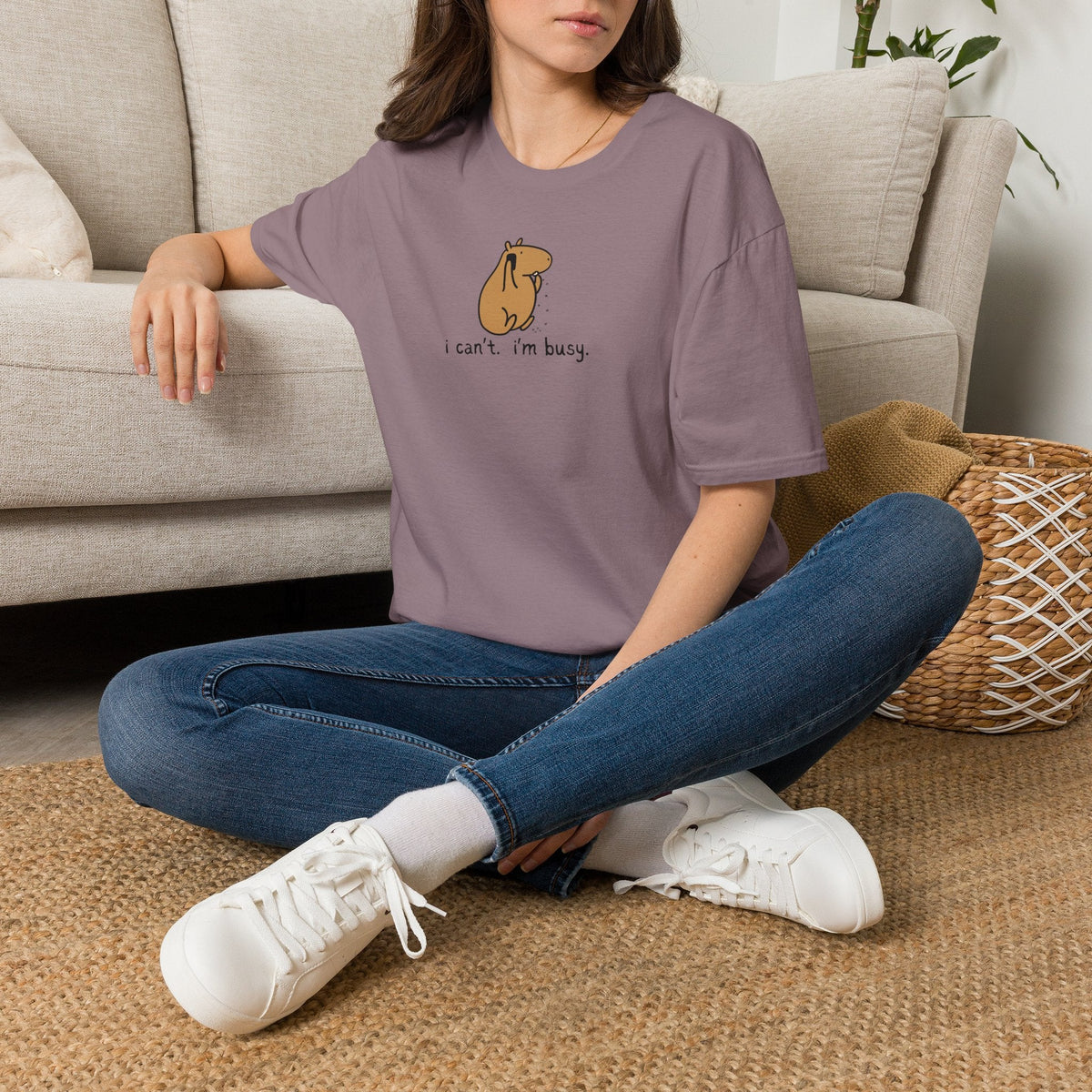 Capy Life softstyle t-shirt in mauve featuring a minimalist illustration of a capybara snacking with humorous text.