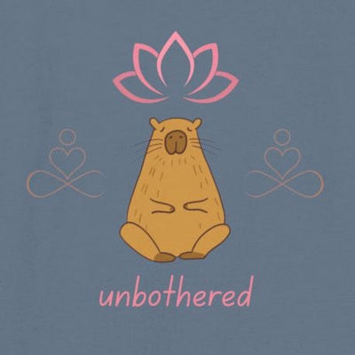 Capy Life minimalist tank top graphic featuring a meditating capybara with a lotus flower and the word unbothered.