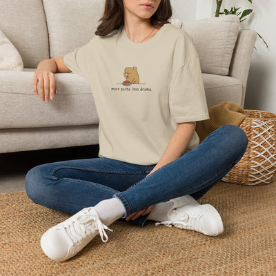 Capy Life softstyle t-shirt in beige featuring a minimalist capybara eating spaghetti with more pasta less drama text