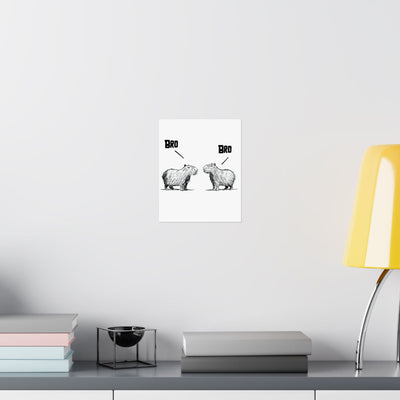Capy Life minimalist wall art print featuring two hand-drawn capybaras saying BRO, displayed on a white wall.