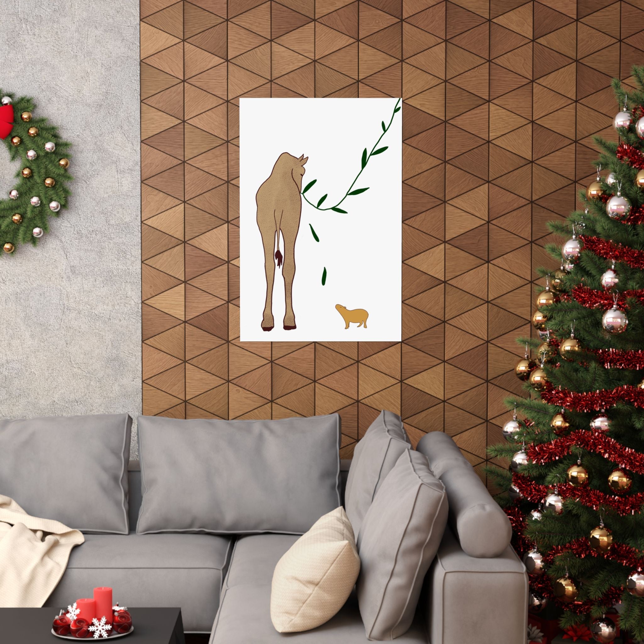 Capy Life minimalist wall art print of a giraffe and capybara hanging in a modern living room with holiday decor