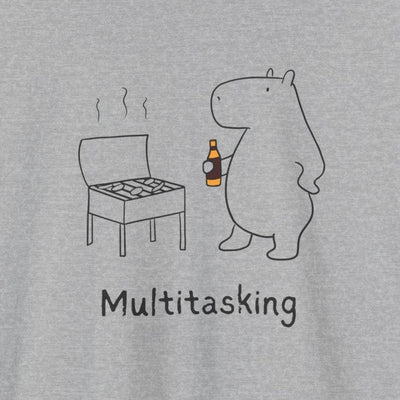 Capy Life grey t-shirt featuring a minimalist line drawing of a capybara grilling with a drink and the text Multitasking