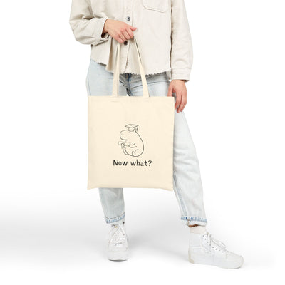 Capy Life natural cotton canvas tote bag featuring a hand-drawn capybara in a graduation cap with the text Now what