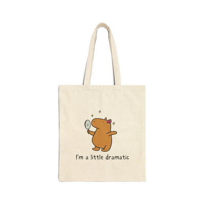 Capy Life natural cotton canvas tote bag featuring a cute capybara holding a mirror with the text I am a little dramatic