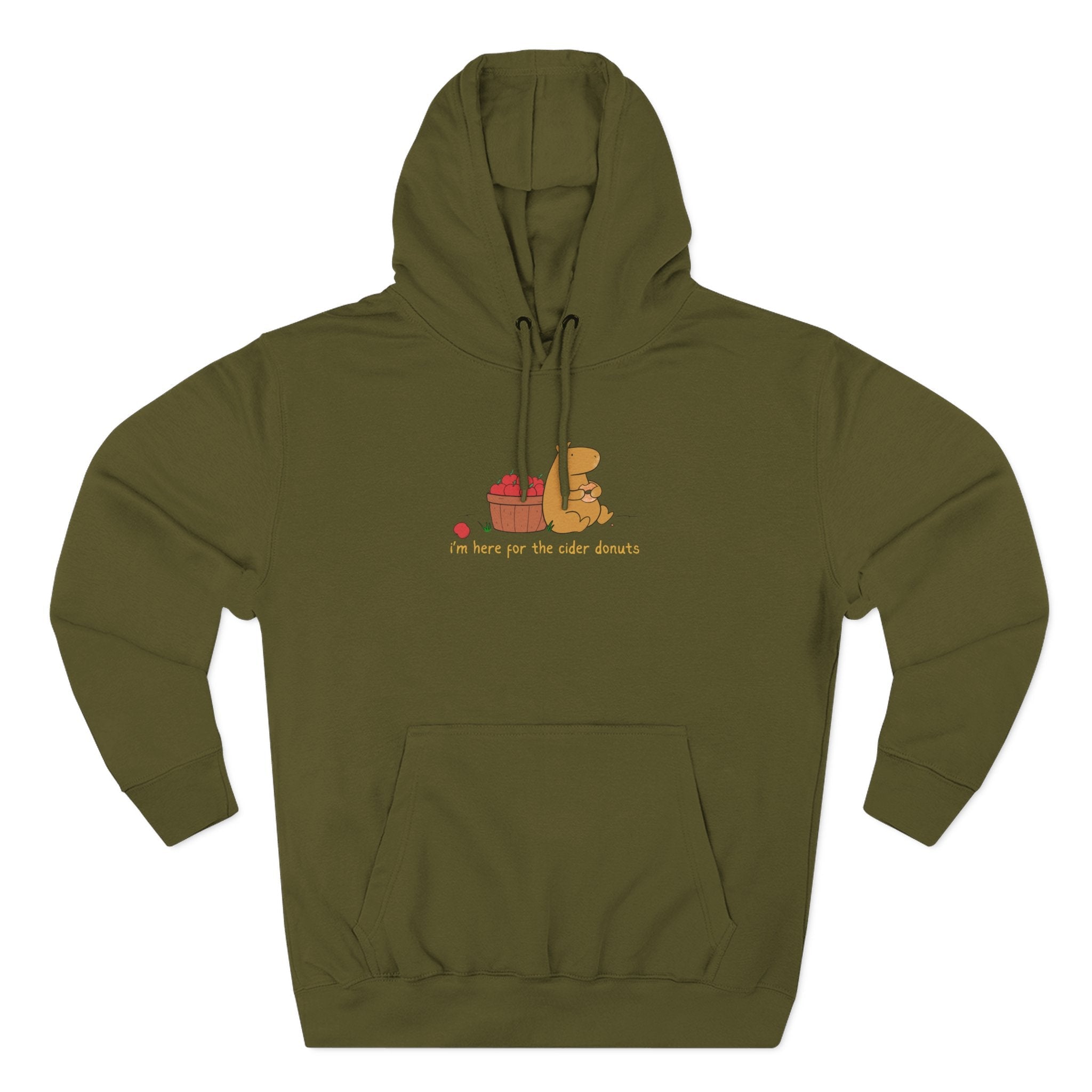 Capy Life olive green fleece hoodie featuring a cute capybara illustration with apples and a cider donut graphic.