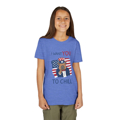 A young girl wearing a blue Capy Life patriotic capybara t-shirt with an Uncle Sam style graphic for 4th of July.