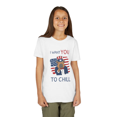 A young girl wearing a white Capy Life patriotic capybara t-shirt with an Uncle Sam style graphic and text.