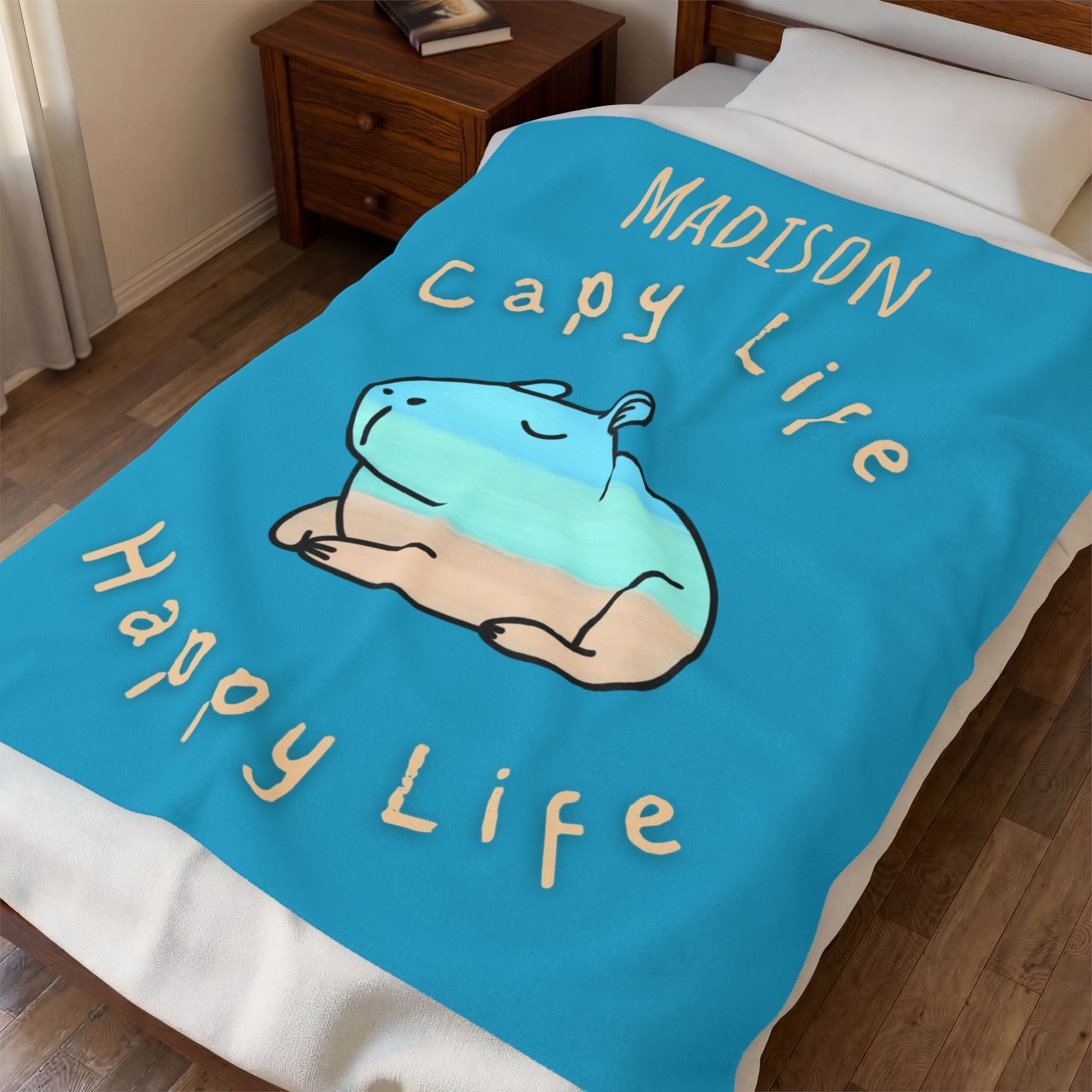 Capy Life personalized blue velveteen throw blanket featuring a hand-painted capybara design and custom name Madison.