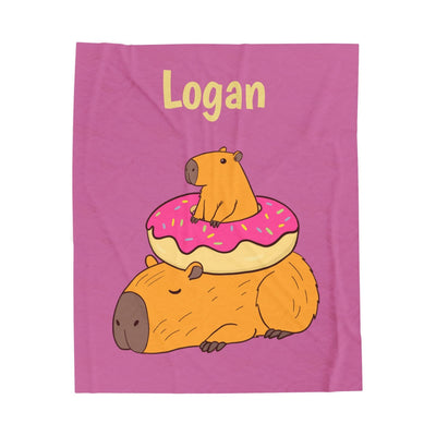 Capy Life personalized kids blanket featuring a cute capybara and donut illustration on a soft pink background.