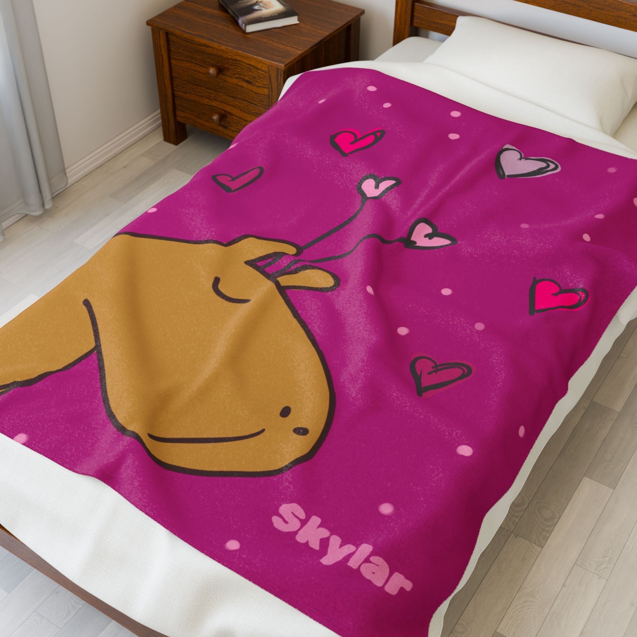 Capy Life personalized pink velveteen throw blanket featuring a cute capybara illustration and hearts on a bed.
