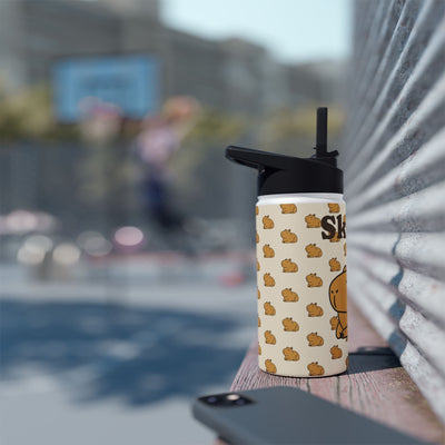 Capy Life personalized kids water bottle with a cute capybara pattern and straw lid, set on a wooden bench outdoors.