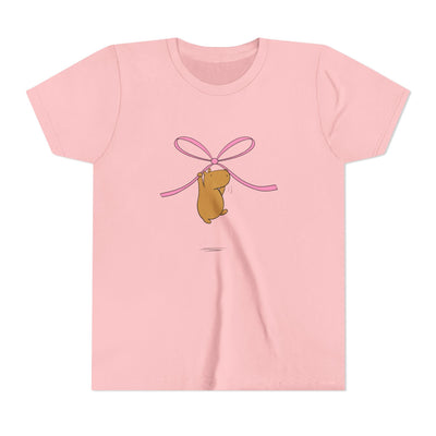 Capy Life kids pink t-shirt featuring a cute capybara hanging from a pink coquette bow graphic