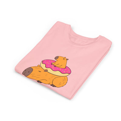 Capy Life youth tee in light pink featuring a cute graphic of two capybaras with a pink frosted donut