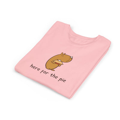 Capy Life pink kids t-shirt featuring Gene the Capybara holding a pie with whipped cream on his nose