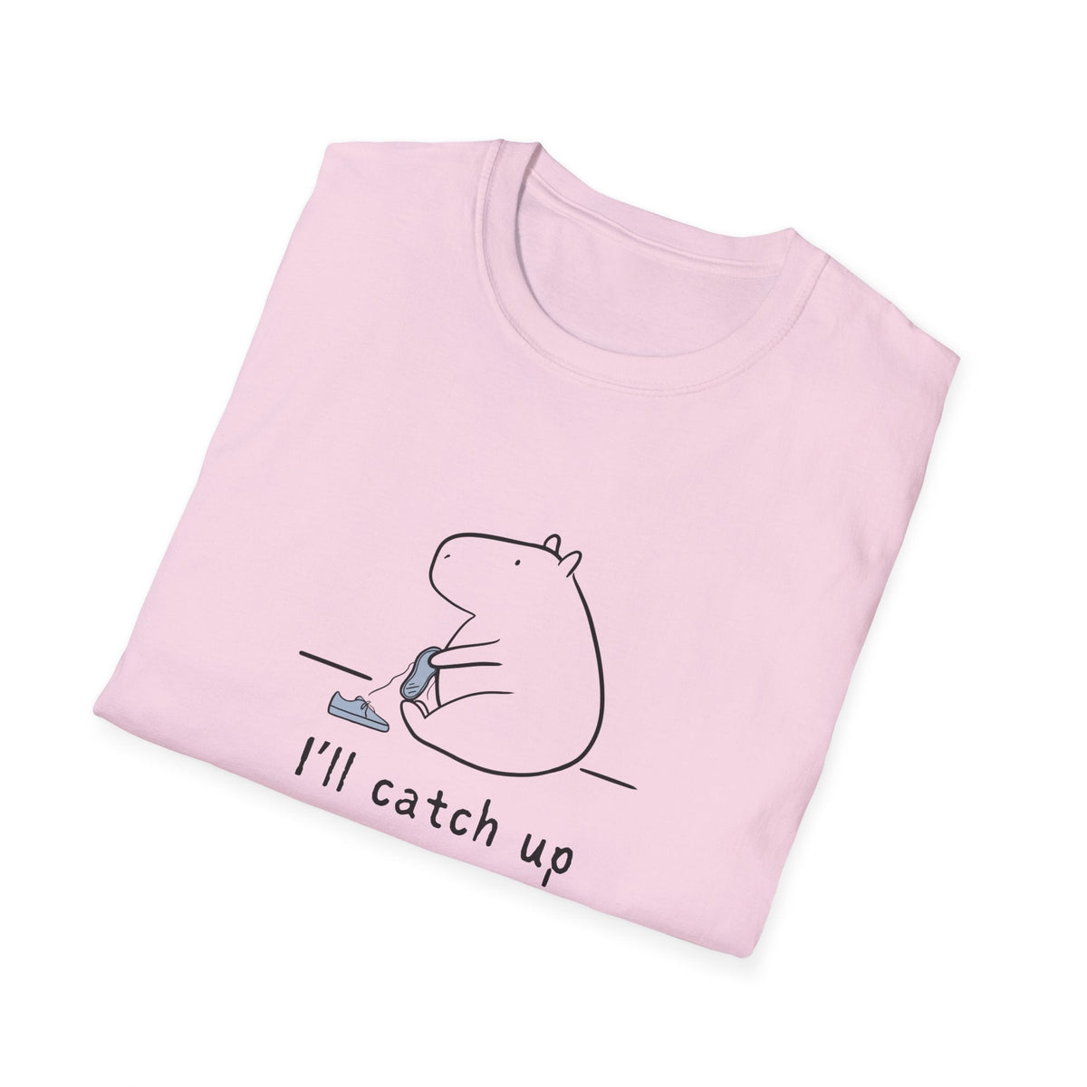 Capy Life light pink softstyle t-shirt featuring a minimalist graphic of a capybara tying its shoe with text I'll catch up