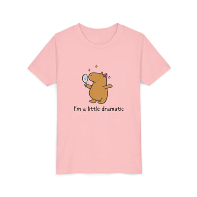Capy Life youth t-shirt in light pink cotton featuring a cute capybara with a bow holding a mirror and sparkles.