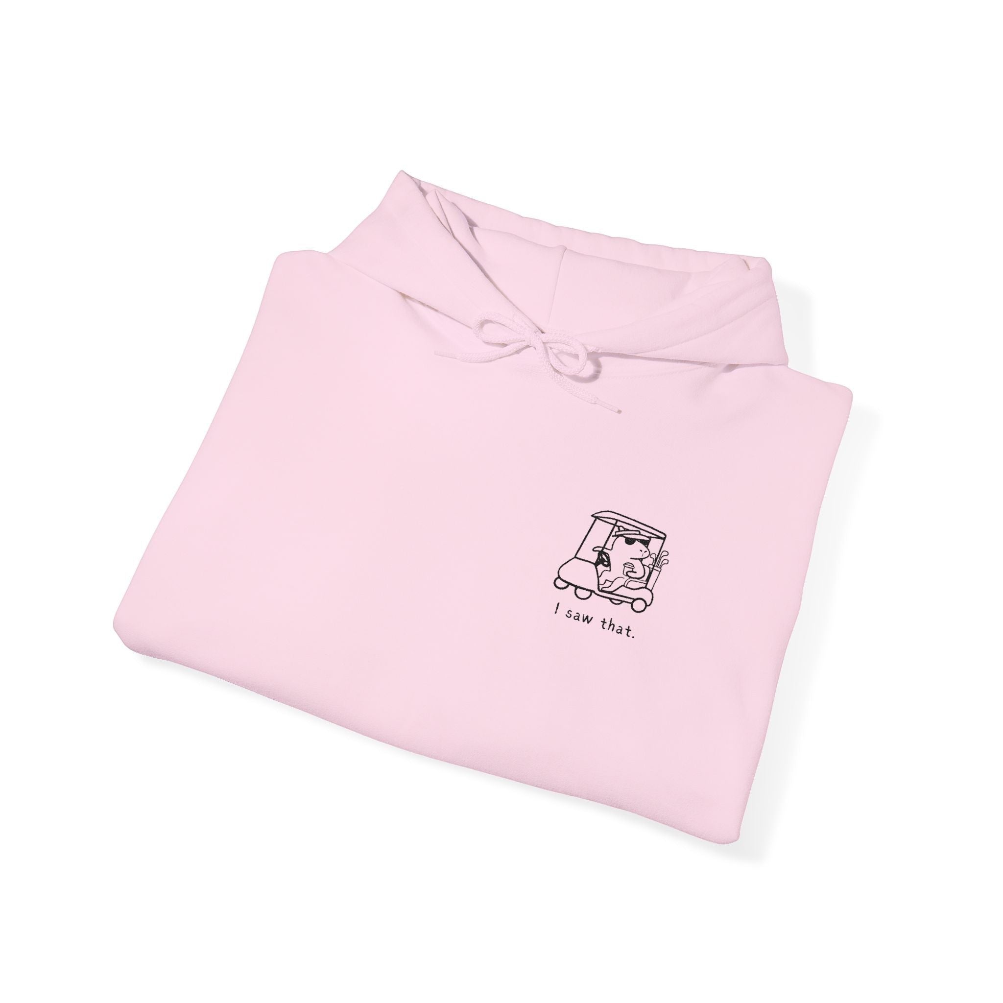 Capy Life light pink minimalist hoodie featuring a small embroidered capybara in a golf cart with I Saw That text.