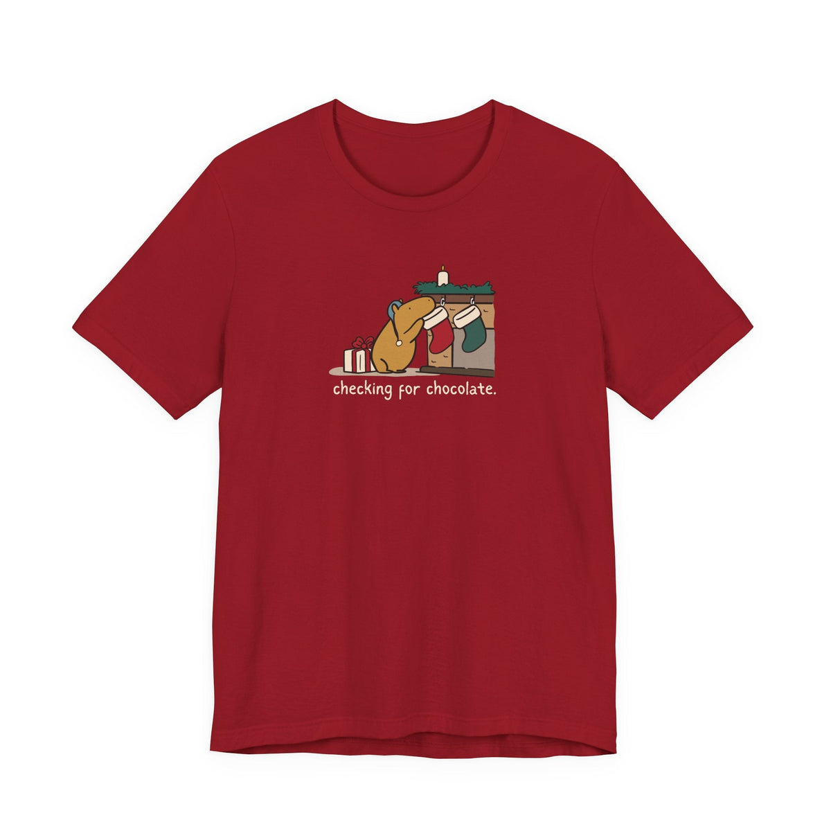 Capy Life red softstyle t-shirt featuring a hand-drawn capybara checking a Christmas stocking for chocolate.