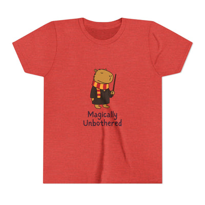 Capy Life youth red t-shirt featuring a cute wizard capybara graphic with the text Magically Unbothered