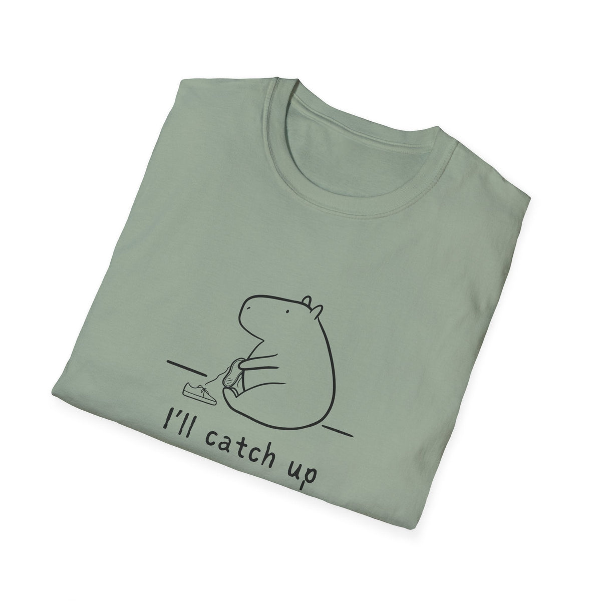 Capy Life sage green softstyle t-shirt featuring a minimalist line art illustration of a capybara tying its shoe.
