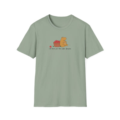 Capy Life sage green softstyle t-shirt featuring a hand-drawn capybara eating a cider donut by a basket of apples.