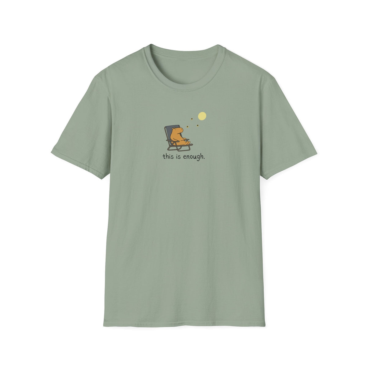 Capy Life softstyle sage green t-shirt featuring a hand-drawn capybara relaxing in a chair under a full moon.
