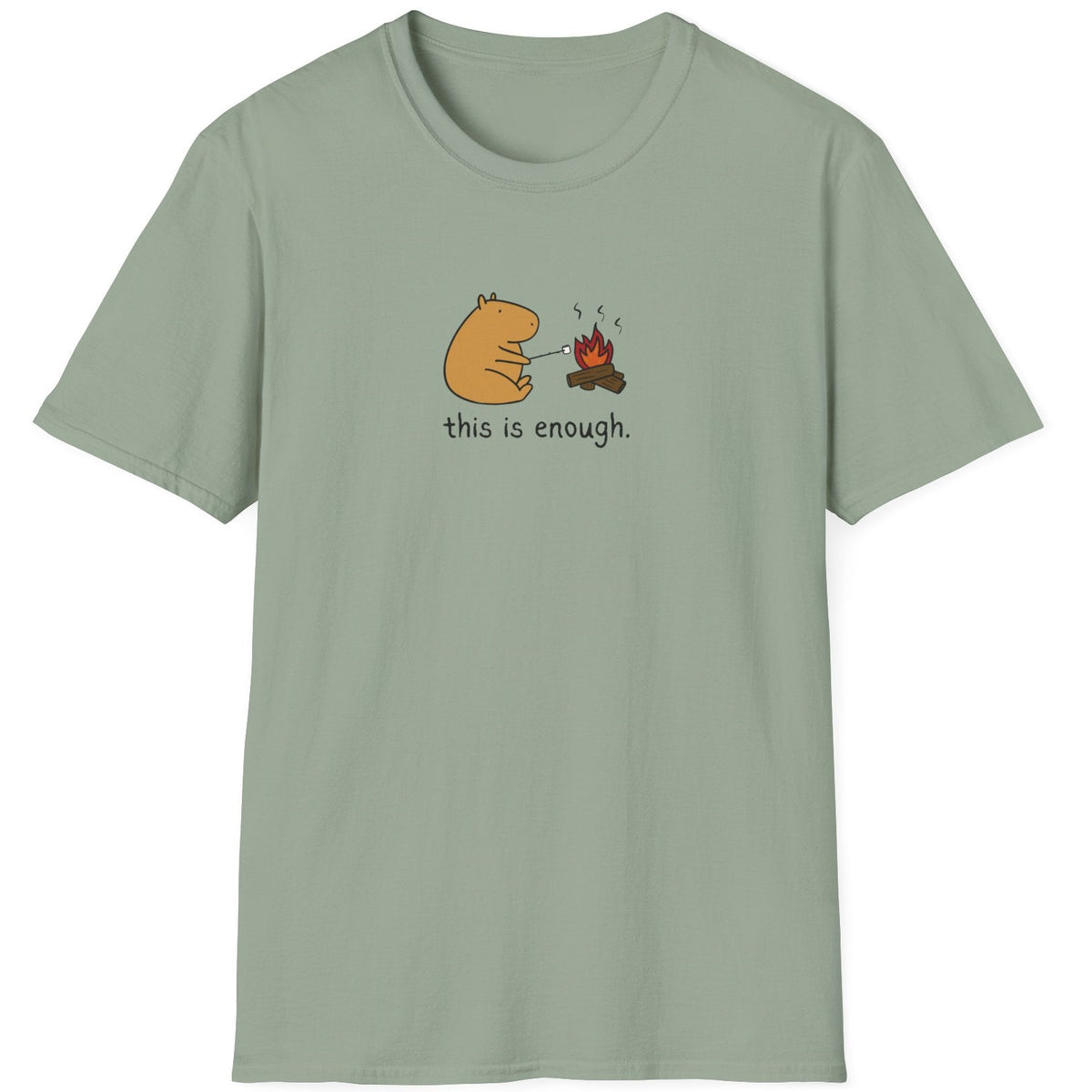 Capy Life sage green softstyle t-shirt featuring a hand-drawn capybara roasting a marshmallow by a campfire.