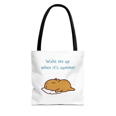 Capy Life white canvas tote bag featuring a cute illustration of a sleeping capybara and the text Wake me up when it's summer