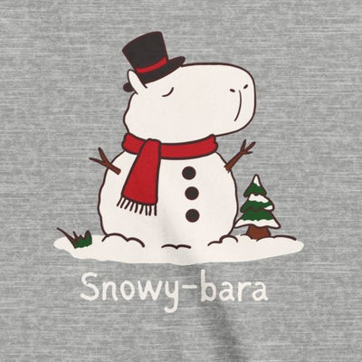 Capy Life kids t-shirt featuring a hand-drawn capybara snowman with a top hat, red scarf, and Snowy-bara text.