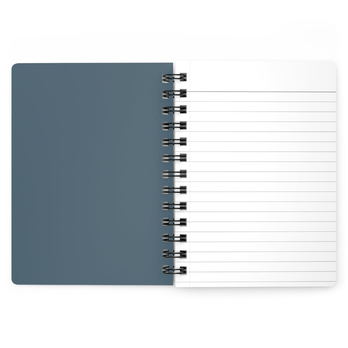 Capy Life spiral notebook with a muted blue cover and lined white paper pages open on a flat surface.