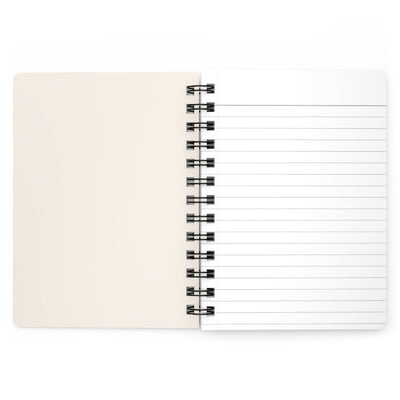 Capy Life spiral-bound notebook opened to show blank cream-colored cover and lined interior pages