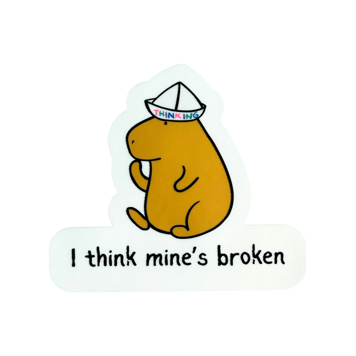 Capy Life die cut sticker featuring a brown capybara wearing a paper thinking hat with the text I think mine is broken