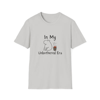Capy Life light grey softstyle t-shirt featuring a hand-drawn calm capybara sitting by a small fire with text.