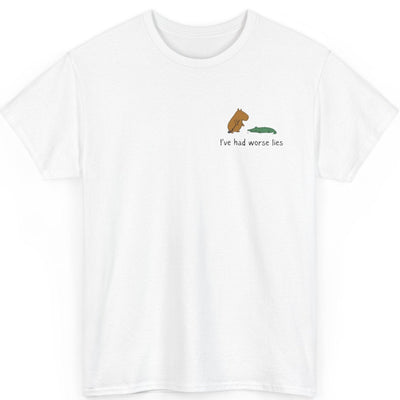 Capy Life white heavy cotton t-shirt featuring a small left chest graphic of a capybara and alligator golfing.