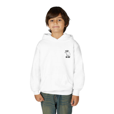 A young boy wearing a white Capy Life kids hoodie with a small embroidered capybara and No Cap text on the chest.
