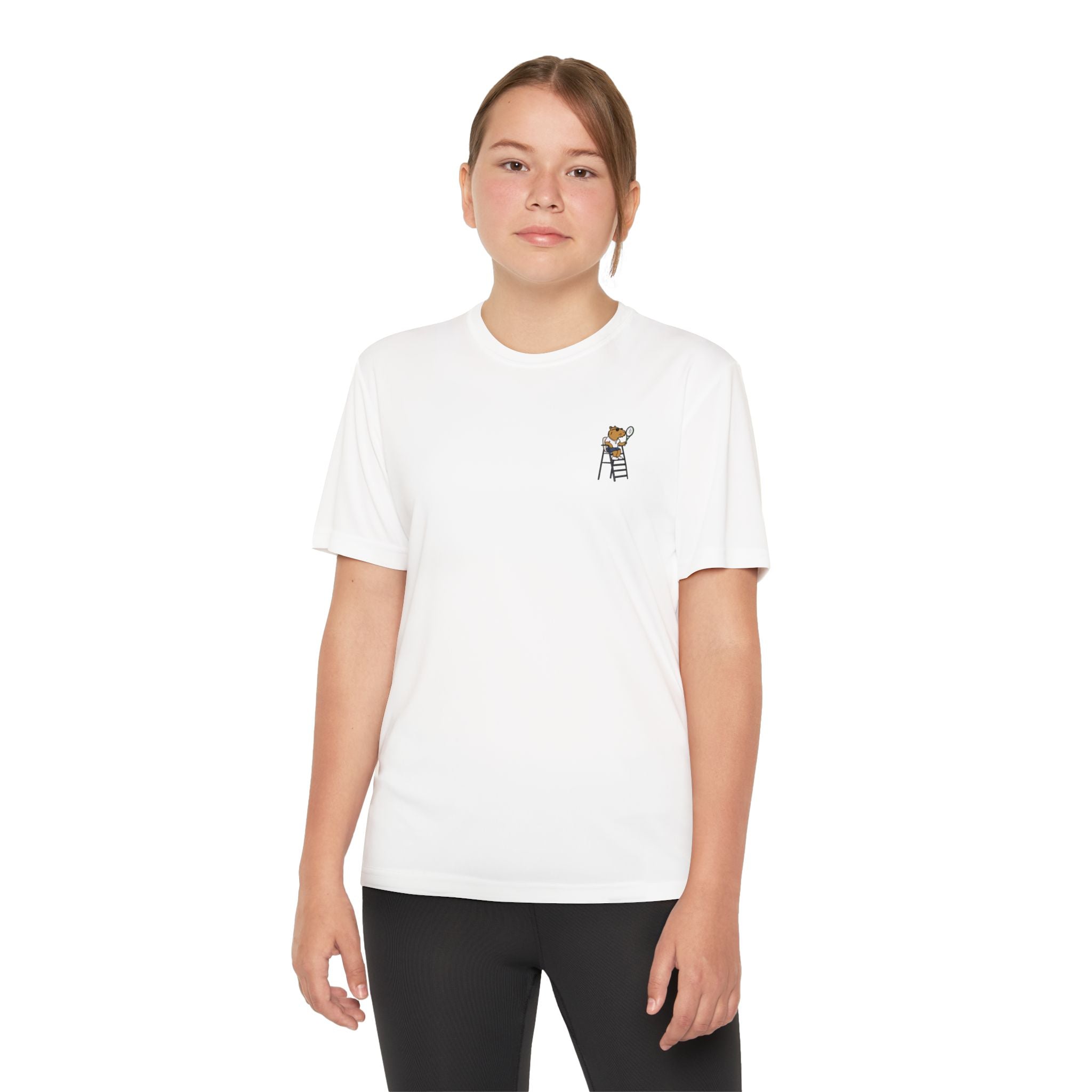 Capy Life kids white performance tennis shirt featuring a small capybara umpire graphic on the left chest